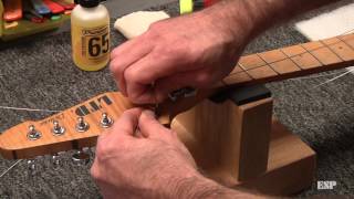 ESP Guitars Restringing a guitar with a Floyd Rose [upl. by Autrey]