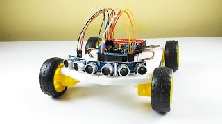 How to make an obstacle avoiding robot with three ultrasonic sensors  Step by step [upl. by Tanhya]