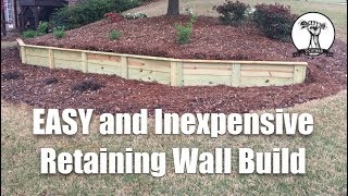 Building an Easy and Inexpensive Retaining Wall [upl. by Drawets]