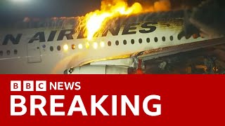 Japan Airlines plane in flames on the runway at Tokyos Haneda Airport BBC News [upl. by Gustafsson]