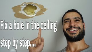 How to repair a hole in ceiling  drywall plasterboard [upl. by Eri]