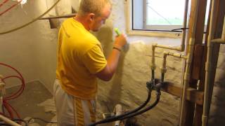 Applying BASF Thoroseal concrete based coating to waterproof basement walls [upl. by Merri6]