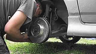 DIY How to change 05  06 Toyota Corolla XRS front brakes  brake pads and rotors [upl. by Uon514]