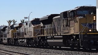 UP 8466 with a northbound manifest with autoracks  Kingsburg Calif Kingsburg station in background [upl. by Yks330]