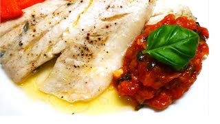 Roasted Sea Bass in lemon juice and butter served with tomato and basil sauce [upl. by Eisdnyl]