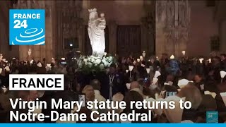 Virgin Mary statue a symbol of resilience returns to NotreDame Cathedral 5 years after fire [upl. by Mailand279]