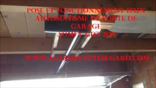 Pose et fonctionnement dun automatisme de porte de garage somfy GDT 200 [upl. by Tsui]