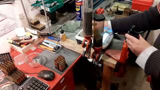 Reloading 65x55 Swedish Mauser final step adding powder and 139 grain Lapua scenar bullet [upl. by Inoj]