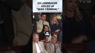 Viral Moment US Rep Rashida Tlaib Holds War Criminal Sign as Netanyahu Speaks  US House  N18G [upl. by Malilliw]