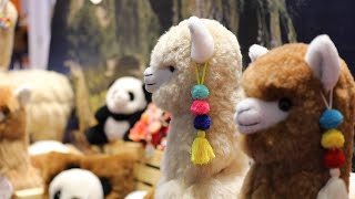 GLOBALink  Peruvian alpaca toys enchant Chinese market at CIIE [upl. by Edyaj504]