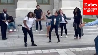 Viral Moment AOC And Cori Bush Dance Outside Capitol During Eviction Moratorium Protest [upl. by Seuqram194]