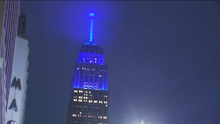 Empire State Building shines blue for WABCTVs 75th anniversary [upl. by Nnaeoj]