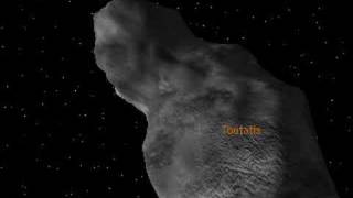 Toutatis asteroid close to Earth [upl. by Ettennod324]