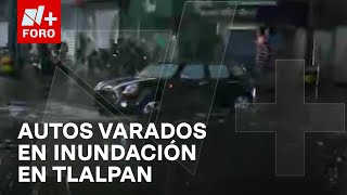 Autos quedan varados por corriente de agua en Calzada de Tlalpan y Periférico  Las Noticias [upl. by Kizzie]