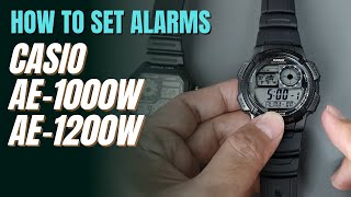 How To Set Alarms and Signal on Casio AE1000W and AE1200W World Time Illuminator  AE1000 AE1200 [upl. by Ahselrac243]