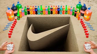 DIY Giant NIKE Logo pit with Coke Mentos Orbeez and Popular Sodas [upl. by Suolekcin]