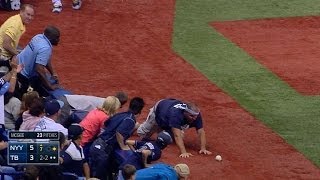 Fan falls onto the field for a foul ball [upl. by Annayhs]