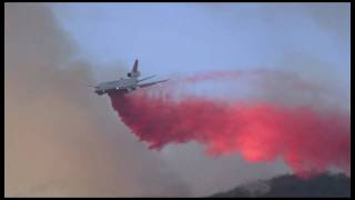 DC10 dropping fire retardant over the quotStationquot fire in La Canada CA [upl. by Adnolahs577]