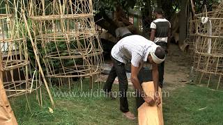 Ravana effigy makers paste the papers on bamboo stick structure in Titarpur New Delhi [upl. by Stclair]