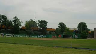 BOGO LORAM rail grinder and a Norfolk Southern Intermodal train [upl. by Rogerg]