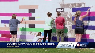 Local artists paint mural at Jackson library [upl. by Yezdnil]