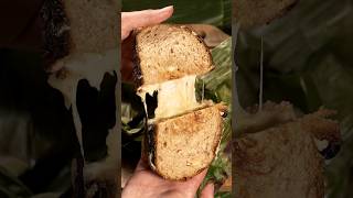 The Worlds First Grilled Cheese Sandwich Cooked Inside Of A Banana Leaf [upl. by Refotsirc72]