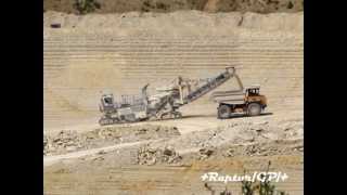 Wirtgen surface miner loads limestone on BELAZ Добыча известняка карьерным комбайном Wirtgen [upl. by Vish]