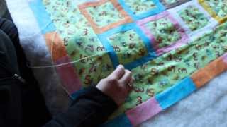 Quilting How to tie a quilt using the quotHidden Tiequot or quotInternational Stitchquot [upl. by Brendin]