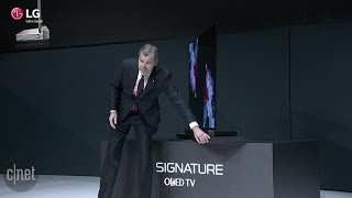 CNET News  LG debuts ultraslim 257mm OLED TV [upl. by Ayekehs]