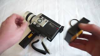 Canon 814 loading Super 8 film and batteries on Super 8 camera Canon Auto Zoom 814 Electronic [upl. by Icyaj]