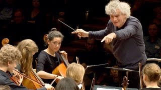 In rehearsal Simon Rattle conducts 6 Berlin school orchestras [upl. by Yelrehs]