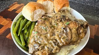 smothered pork chops over mashed potatoes  recipe [upl. by Nofets311]