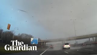 Tornado captured on dashcam as it crosses M25 in Surrey [upl. by Damha]