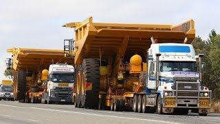 Tri Drive Mack Titan with a Caterpillar 785C dump truck [upl. by Aisatna]