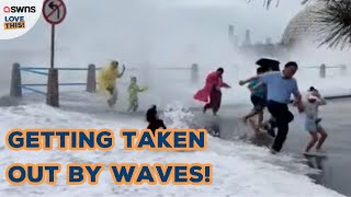 Tidal waves SWEEPS tourist off their feet 🌊🤭  LOVE THIS [upl. by Auqinu]