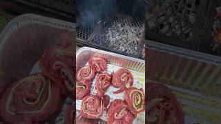 Grilling flank steak pin wheels [upl. by Norita]