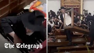 Riot breaks out in New York City synagogue over secret tunnel [upl. by Aurelea790]