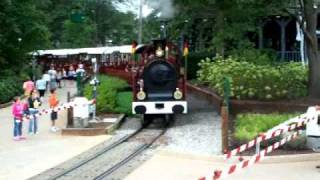 Red train departing tweedside station Busch Gardens Williamsburg Va [upl. by Akiraa671]