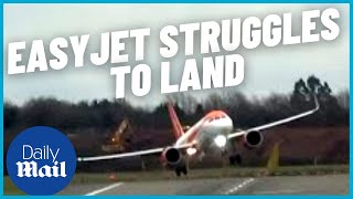 Storm Eunice Terrifying moment EasyJet plane lands during gale force winds [upl. by Berard]