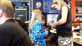 Young Iron Maiden Fan Happy To Get Nicko McBrains Autograph At Rock N Roll Ribs [upl. by Leelaj406]