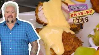 Guy Fieri Eats DEEPFRIED Chicken Cordon Bleu  Diners DriveIns and Dives  Food Network [upl. by Amekahs]