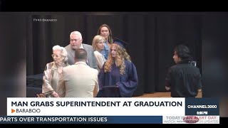 Parent pushes Baraboo Superintendent at graduation [upl. by Aicargatla]