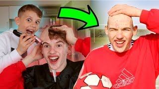 LOSER SHAVES HEAD FOOTBALL CHALLENGE [upl. by Chyou412]