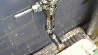 Flushometer Toilet Leaking Badly When Flushed [upl. by Ahsaet294]