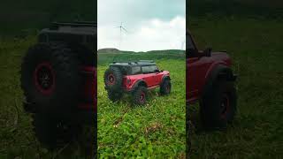 Watch the Wltoys 104020 RC Rock Crawler move gracefully across the serene wideopen grasslands [upl. by Judie873]