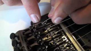 Restringing a guitar with a locking tremolo Floyd Rose [upl. by Ettelohcin]