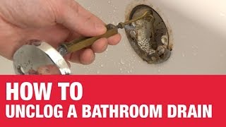 How to Unclog a Bathtub Drain  Ace Hardware [upl. by Kerril]