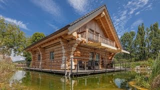 Naturstammhaus TV  Blockhaus in Luzern [upl. by Atiekram407]