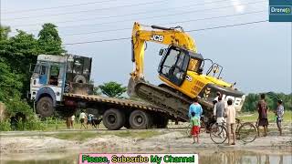 Experienced Excavator Operator Loading And Unloading Excavator [upl. by Yecac]