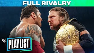 Batista vs Triple H – RIVALRY HISTORY WWE Playlist [upl. by Lepley]